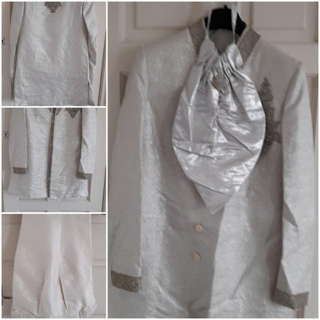 Preview of the first image of Brand new3 piece, Men' wedding outfit in Silver., elegant.