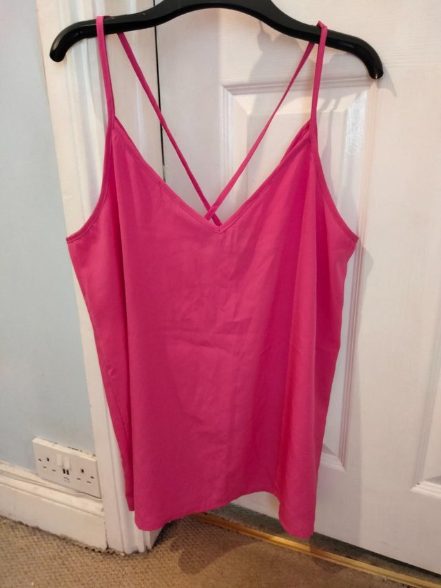Preview of the first image of Pink Strappy Camisole Top Size 16/18.