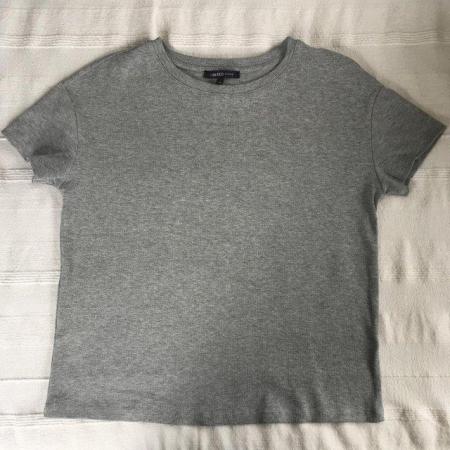 Image 1 of Woman's grey short-sleeve t-shirt.  Size 10.