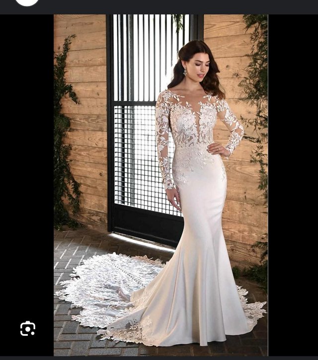 Preview of the first image of Essence of Australia Sexy Lace Wedding Dress with Shee.