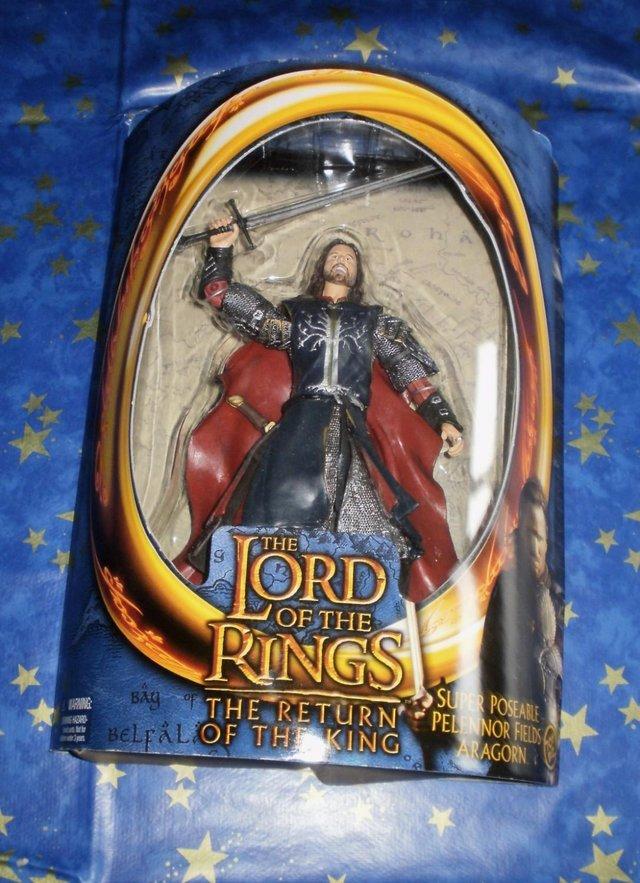 Preview of the first image of Toy Biz lord of the Rings Figure Aragorn. never been out of.