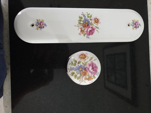 Preview of the first image of White Ceramic Flower Door Handles/Finger plates.