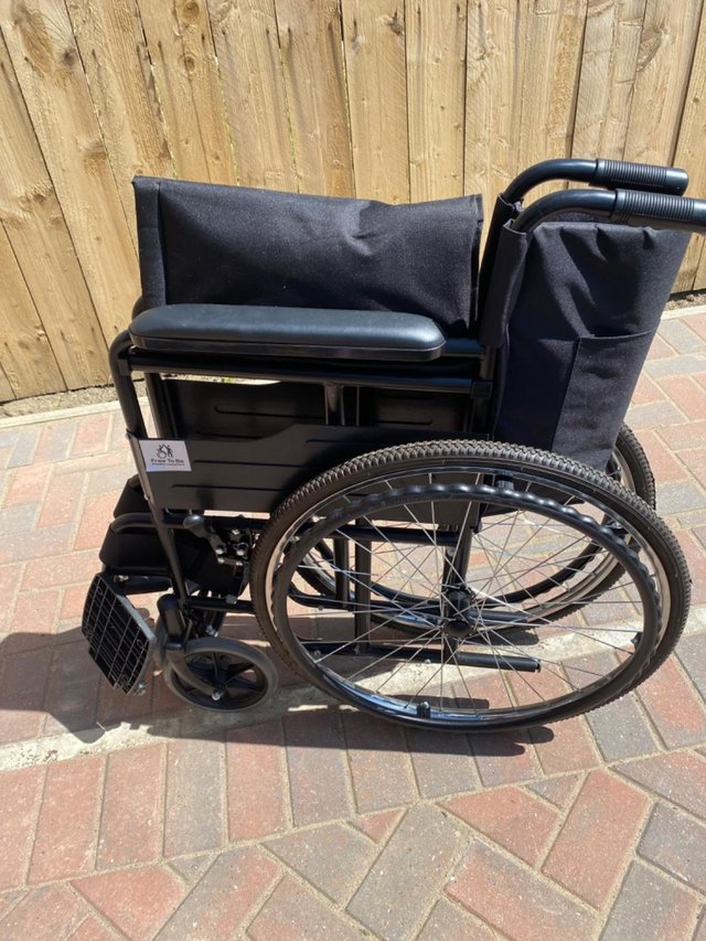 Preview of the first image of Wheel chair Black. Hardly Used.