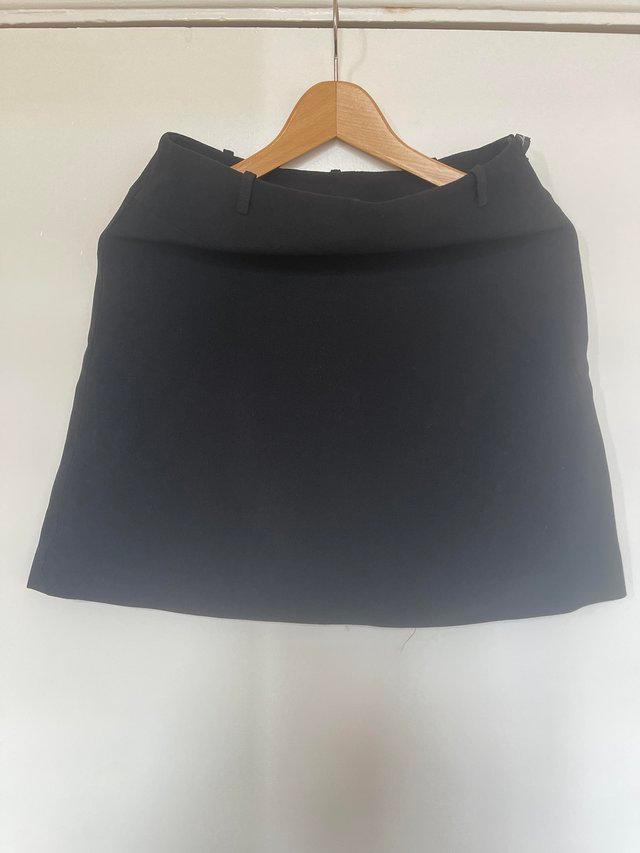 Preview of the first image of Karen Millen lined  black mini skirt..