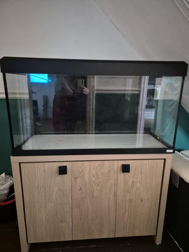 Preview of the first image of 200lt fluval fish tank and stand.