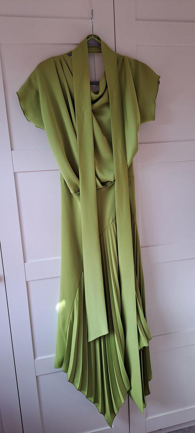 Preview of the first image of Kevan Jon Mila dress, size 2, in pear colour.