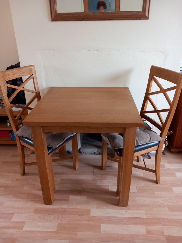 Preview of the first image of Square table and two chairs.