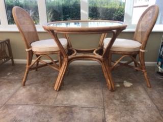 Preview of the first image of Cane Conservatory Table & Two Matching Chairs.