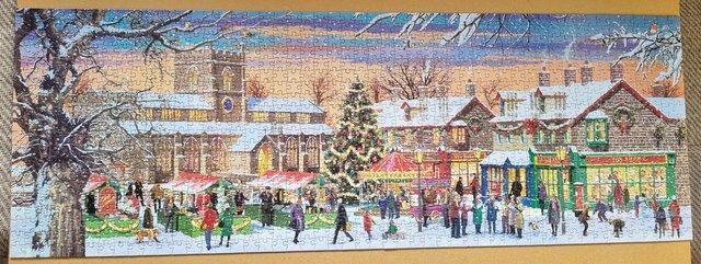 Image 3 of 1000 piece jigsaw called A CHRISTMAS MARKET TOWN by W.H.SMIT