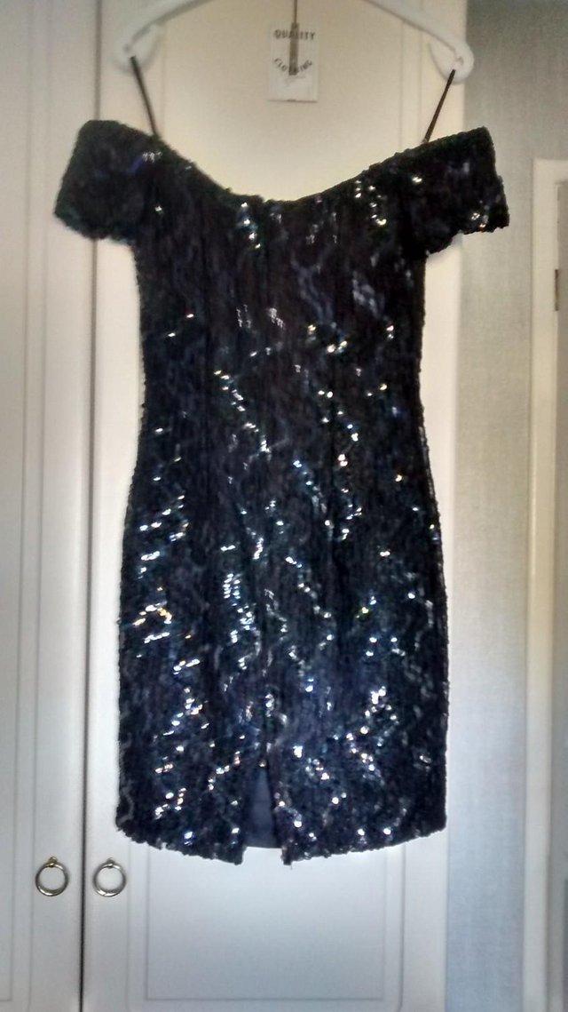 Preview of the first image of Size 10, black evening/party dress..