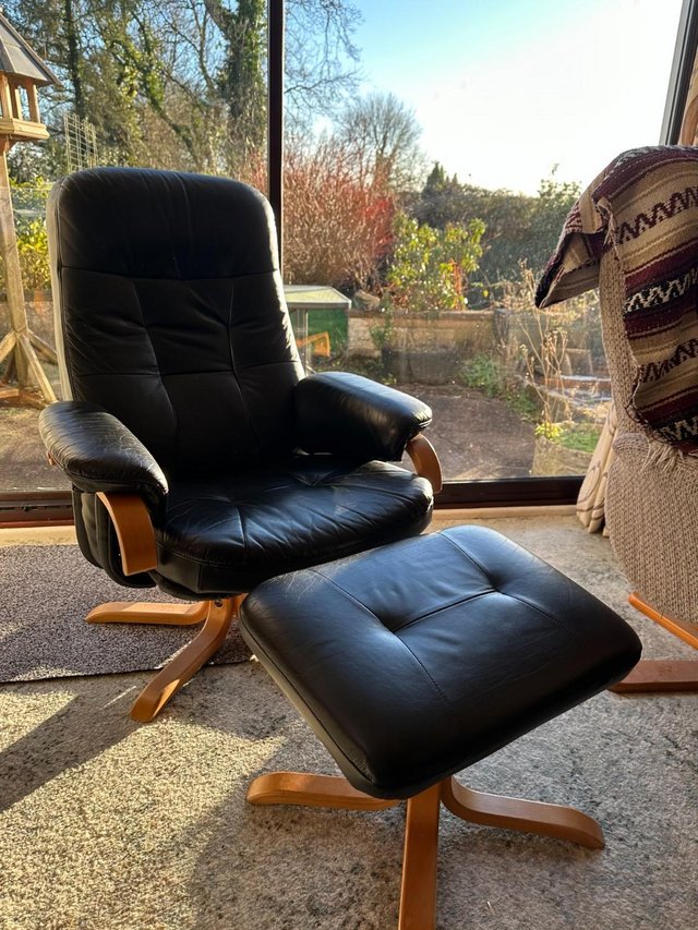 Preview of the first image of Reclining Faux Leather Chair & Matching Footstool VG.
