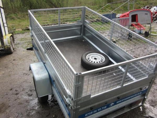 Image 4 of like new caged tipping trailer