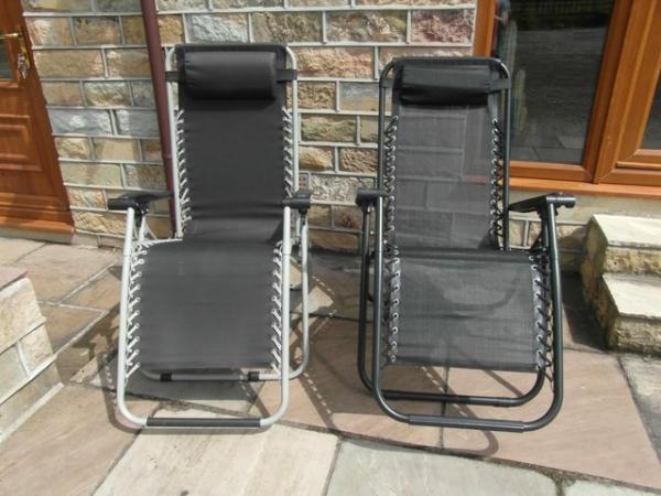 Image 2 of 2 zero gravity chairs folding chairs used a few times