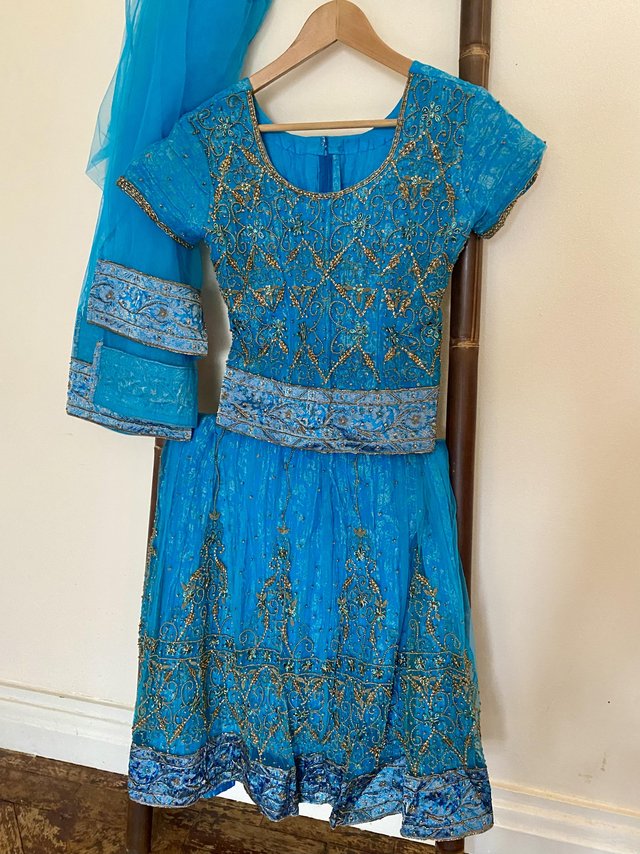 Preview of the first image of Elegant teal blue and sequins embroidered lengha.