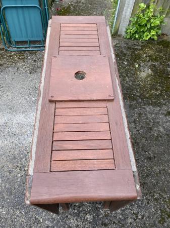 Image 1 of Solid wood folding garden table for six people.
