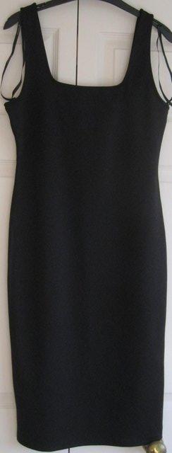 Preview of the first image of NEW Black straight sleeveless Dress, size 10.