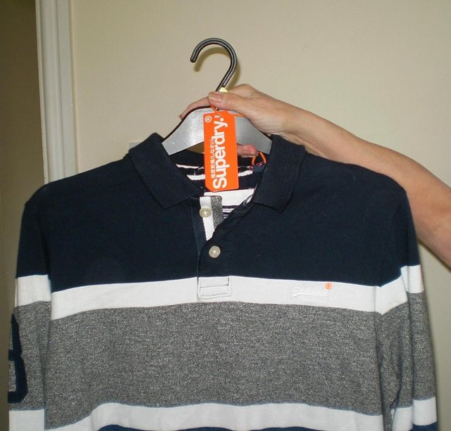 Preview of the first image of Brand New Superdry mens top.
