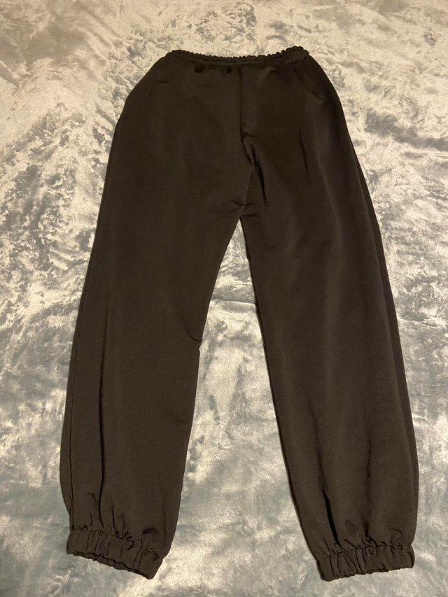 Preview of the first image of Black Joggers, without fleece, size S.