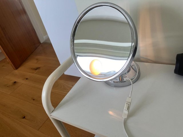 Preview of the first image of Beauticians Adjustable Electronic Mirror.