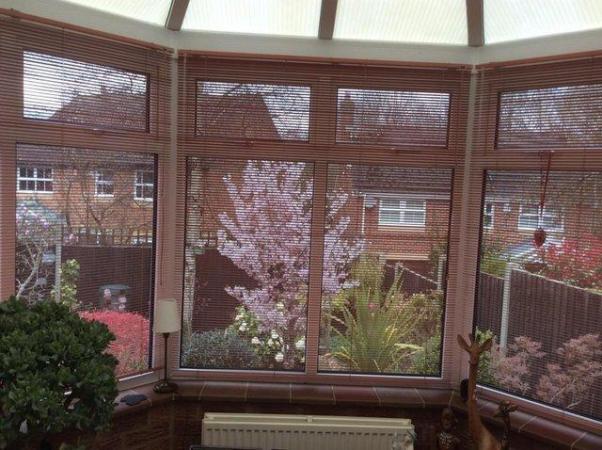 Image 2 of Venetian style micro blinds, in terracotta colour