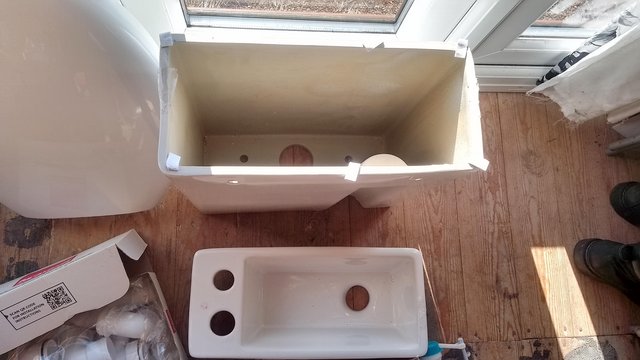 Preview of the first image of Toilet with hand wash basin on top.