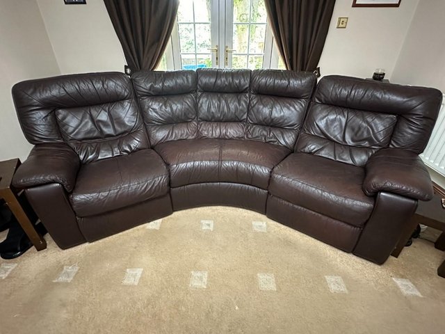 Preview of the first image of Genuine brown leather 4 seater recliner in Garswood.