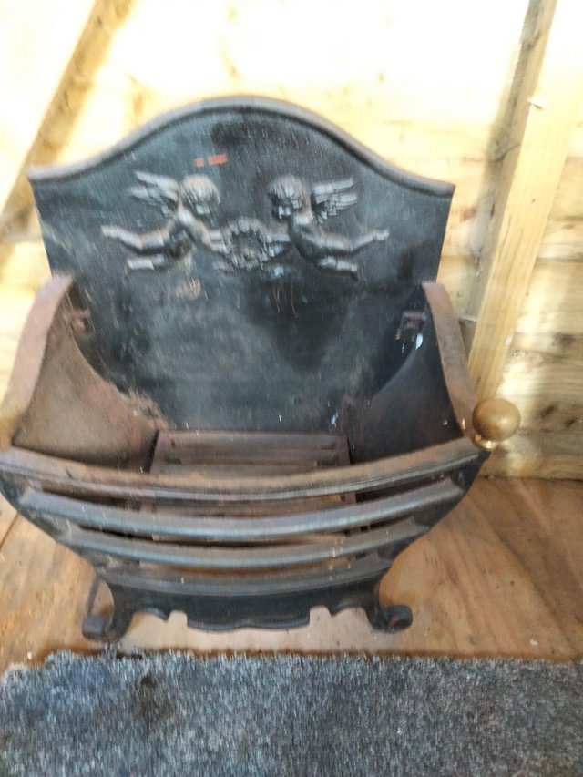 Preview of the first image of Cast iron fire basket with back plate.