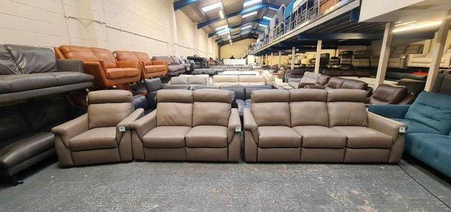 Preview of the first image of Adriano taupe leather electric recliner sofa set.
