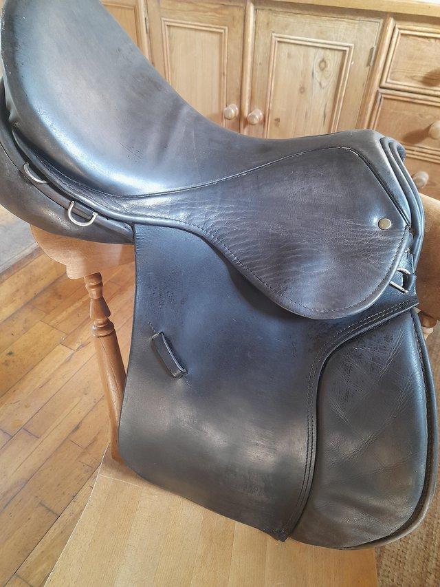 Preview of the first image of Black leather saddle wide.