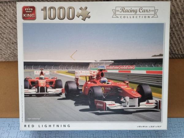 Image 3 of 1000 piece jigsaw called RED LIGHTNING BY King Puzzles.