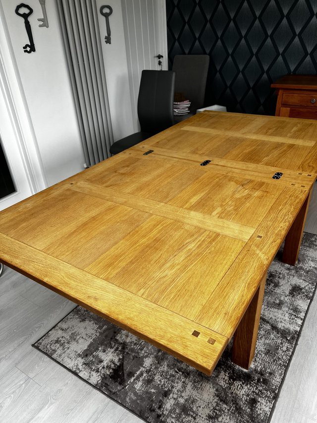 Preview of the first image of Oak flip top dining table.