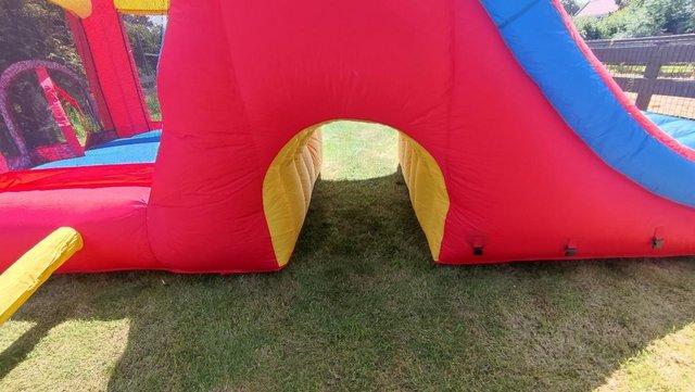 Image 3 of HAPPY HOP mega double combo slide bouncy castle