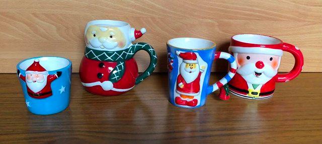 Image 2 of FOUR NEW FESTIVE  CHRISTMAS MUGS IN DIFFERENT DESIGNS
