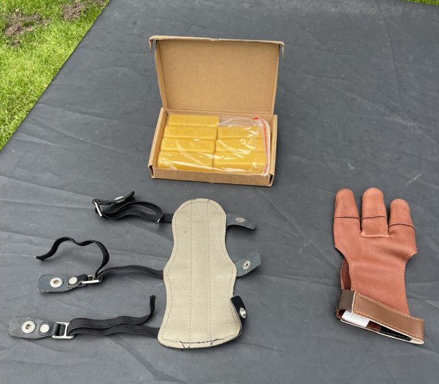 Preview of the first image of Archery Accessories, Glove, Armguard, beeswax.