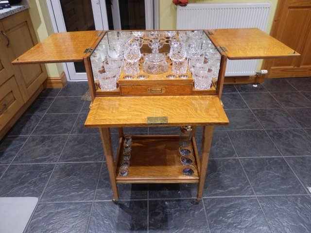 Preview of the first image of AN ANTIQUE EDWARDIAN DRINKS CABINET..