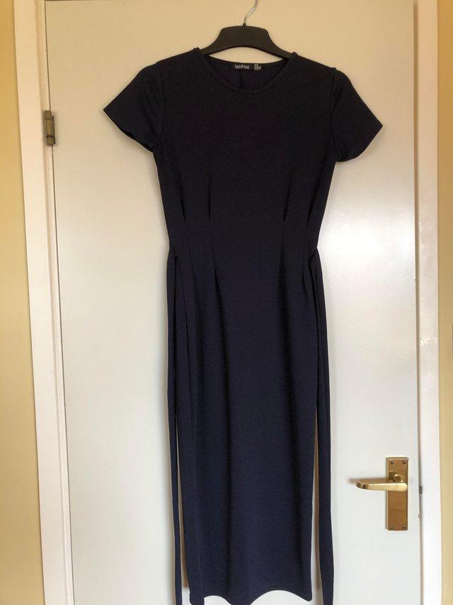 Preview of the first image of Elegant navy blue Boohoo slimline dress.