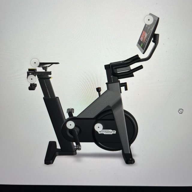 Preview of the first image of Technogym Group Cycle Direct Exercise Bike.