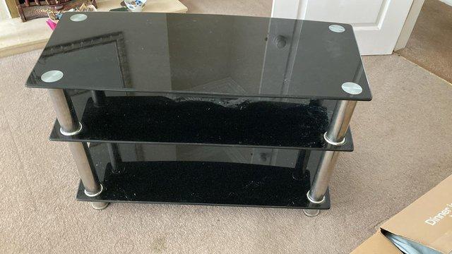 Image 1 of LCD Television with glass stand.