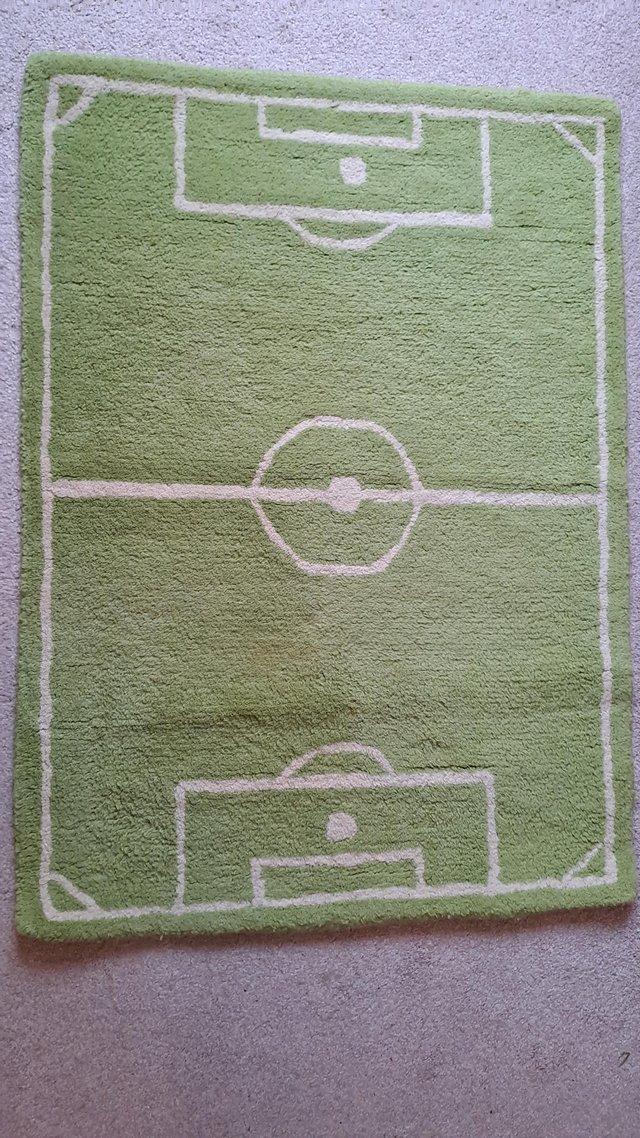 Preview of the first image of Little football carpet good condition.