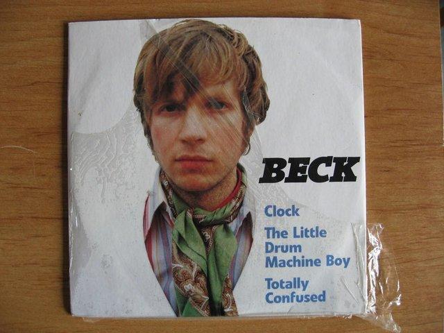 Preview of the first image of Beck – Clock / The Little Drum Machine Boy / Totally Confus.