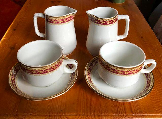 Preview of the first image of 6 PIECEVINTAGE MATCHING CUPS, SAUCERS AND CREAM/MILK JUGS.