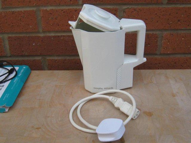 Preview of the first image of Morphy Richards portable electric kettle.