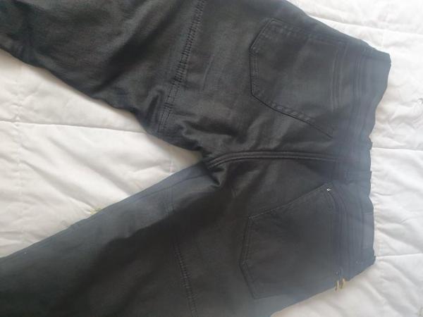 Image 1 of MOTORCYCLE BOOTS AND TROUSERS
