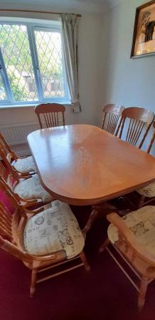 Image 1 of High quality dining room table with 8 chairs,2 are carvers.