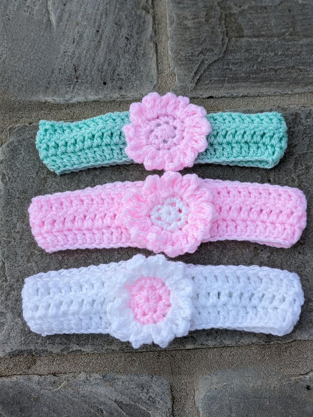 Preview of the first image of 0/6 months headbands price is for all 3.
