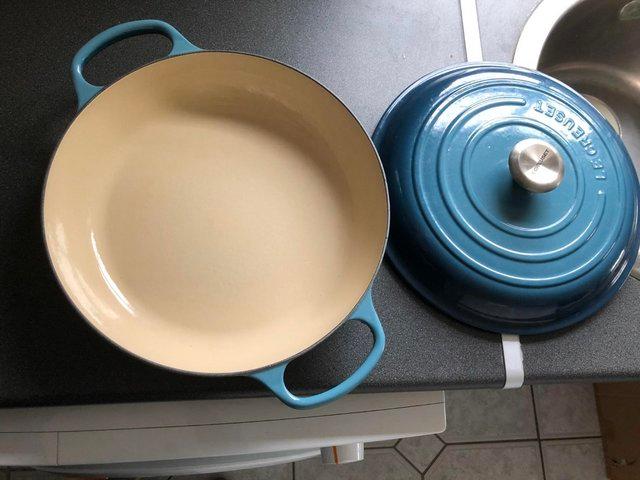 Preview of the first image of Le Creuset shallow casserole dish. Deep teal. 30cm..