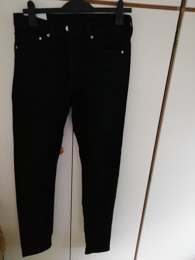 Preview of the first image of H & M jeans new x 2 & 1 worn pair.