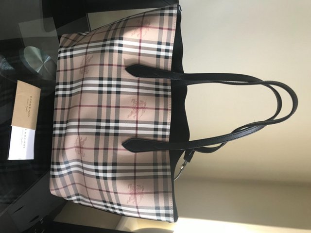 Preview of the first image of Burberry leather tote bag, nearly new.