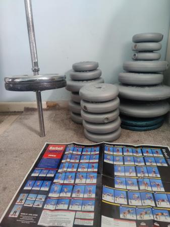 Image 2 of 130kg+ Assortment of weights and a Metal Barbell