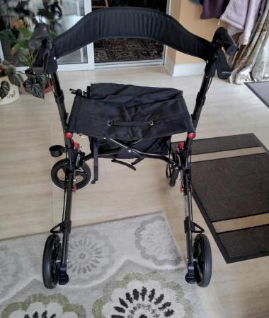 Image 3 of 4 wheeled rollator, good condition.